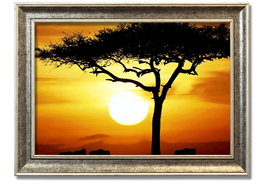 Framed print of an African safari tree illuminated by sunlight, showcasing vibrant colors and intricate details.