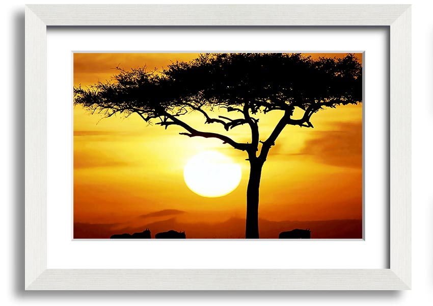 Framed print of an African safari tree illuminated by sunlight, showcasing vibrant colors and intricate details.