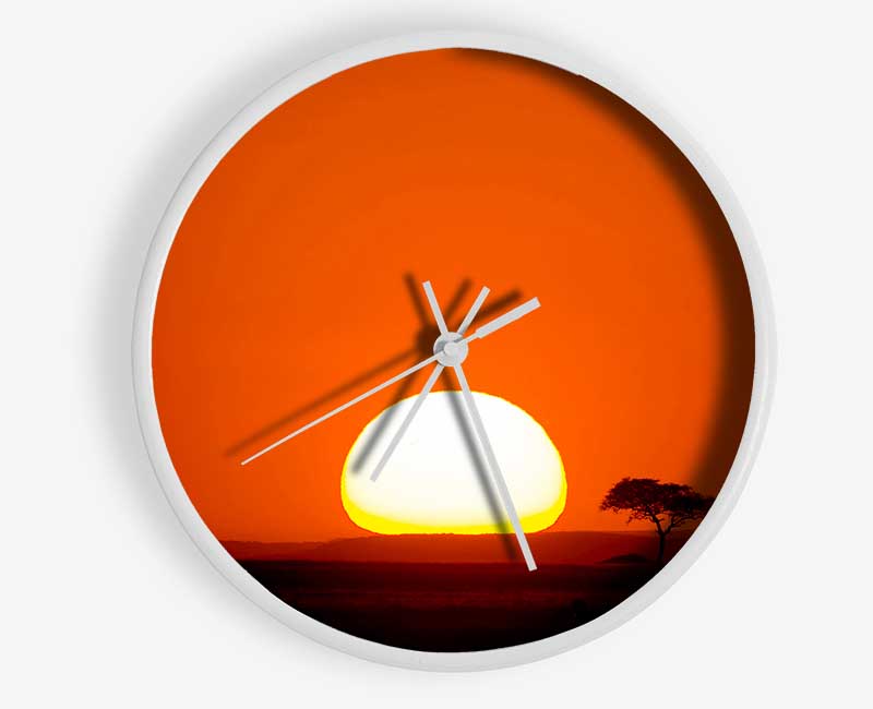 African Sunrise clock made from natural bamboo with a round face, available in black, white, and natural frame colors.