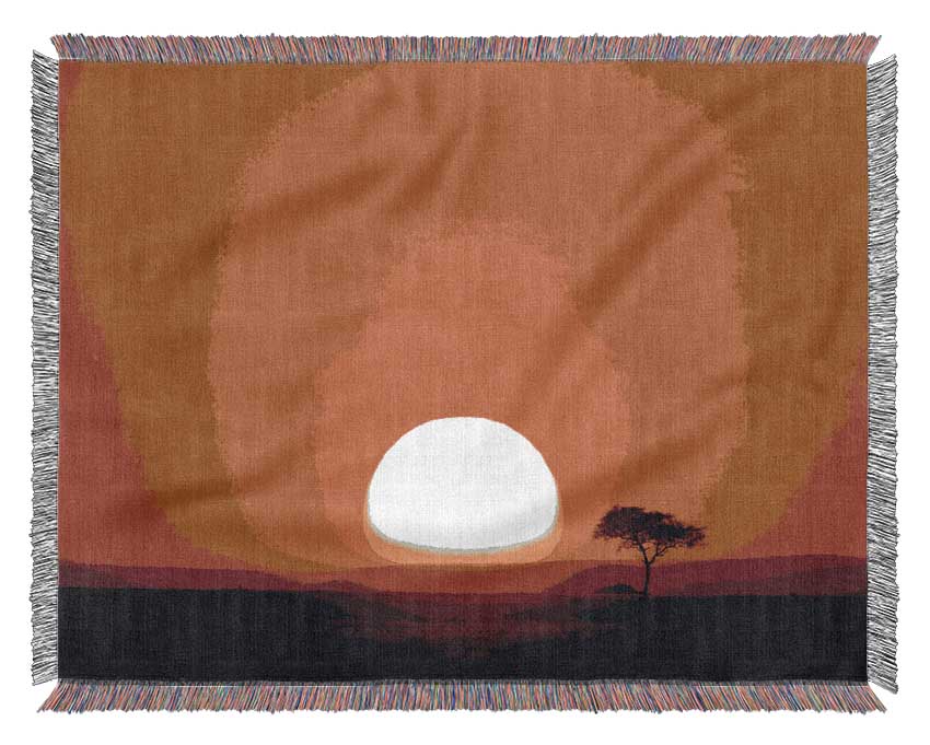 A luxurious African Sunrise throw blanket made from 100% cotton, featuring a thermal weave design in warm, inviting colors.