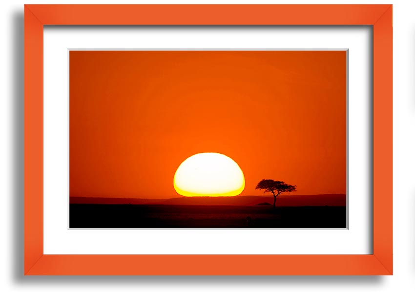 A beautifully framed print of an African sunrise, showcasing vibrant colors and landscape details, ready to hang.