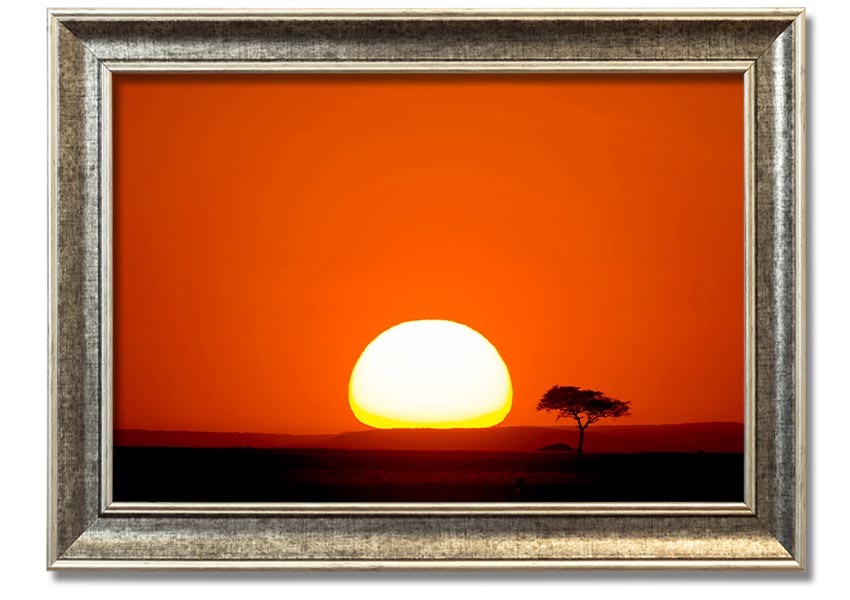 A beautifully framed print of an African sunrise, showcasing vibrant colors and landscape details, ready to hang.