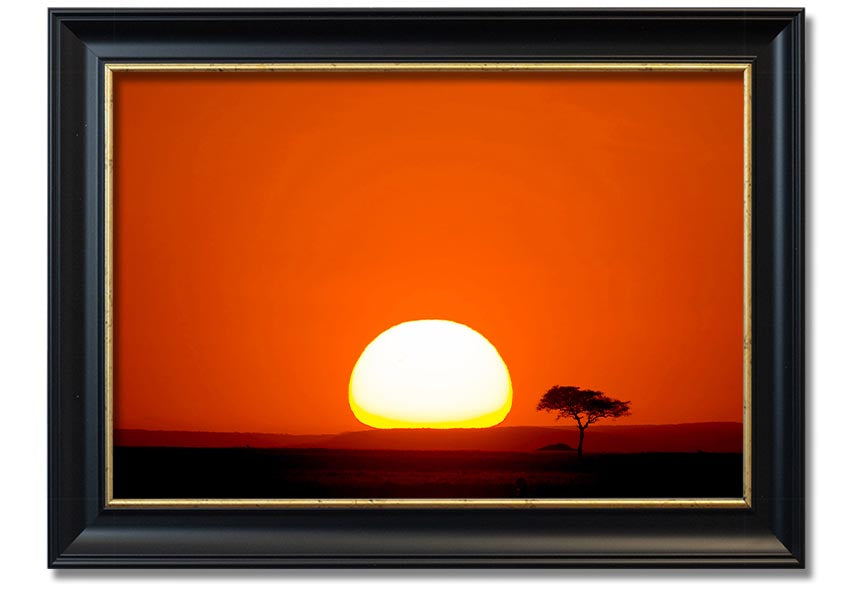 A beautifully framed print of an African sunrise, showcasing vibrant colors and landscape details, ready to hang.