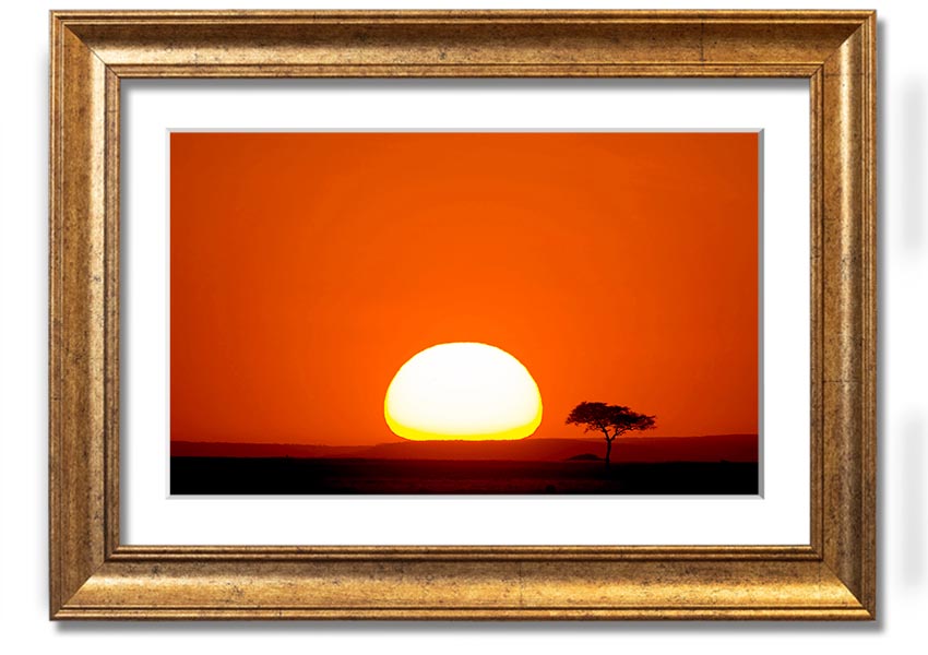 A beautifully framed print of an African sunrise, showcasing vibrant colors and landscape details, ready to hang.