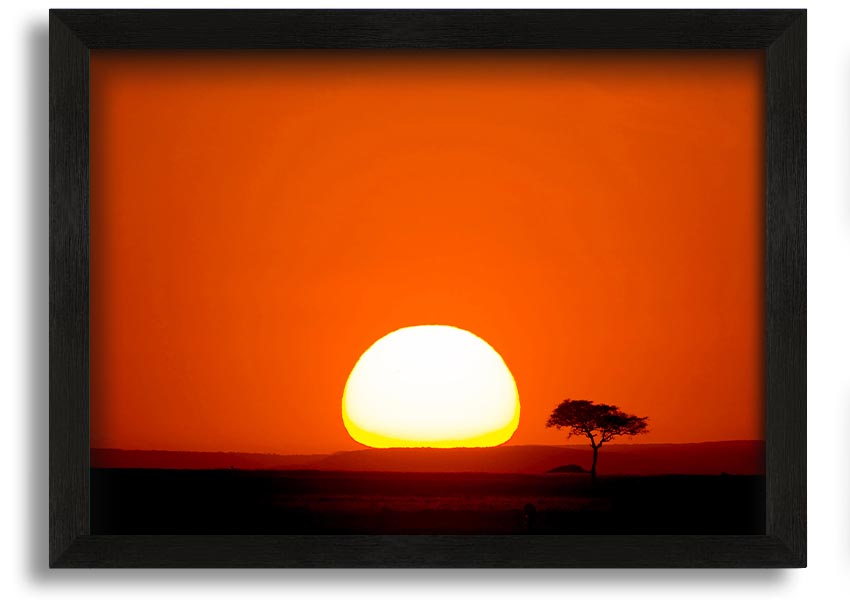 A beautifully framed print of an African sunrise, showcasing vibrant colors and landscape details, ready to hang.