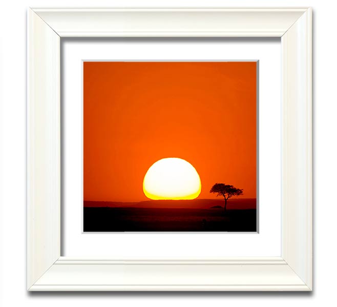 A beautifully framed print of an African sunrise, showcasing vibrant colors and stunning landscape details.