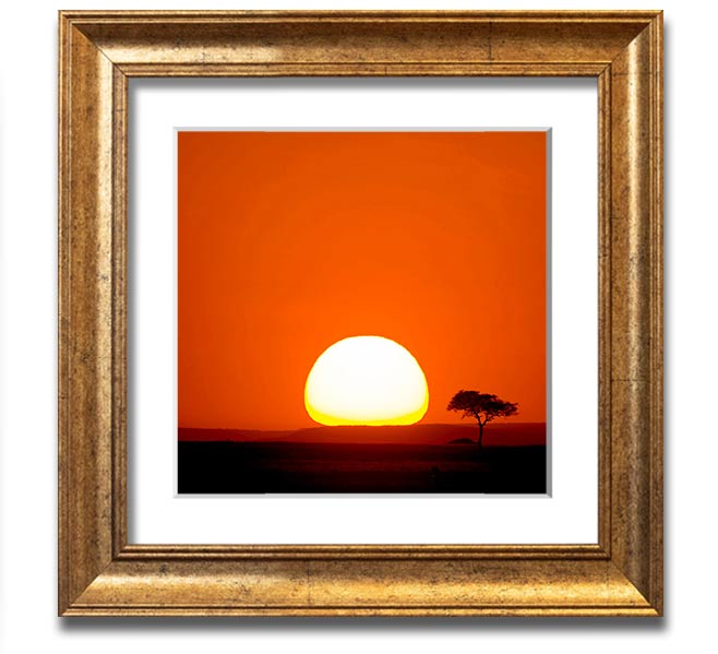 A beautifully framed print of an African sunrise, showcasing vibrant colors and stunning landscape details.