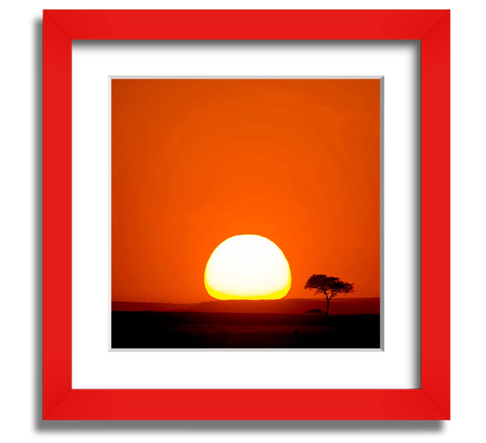 A beautifully framed print of an African sunrise, showcasing vibrant colors and stunning landscape details.