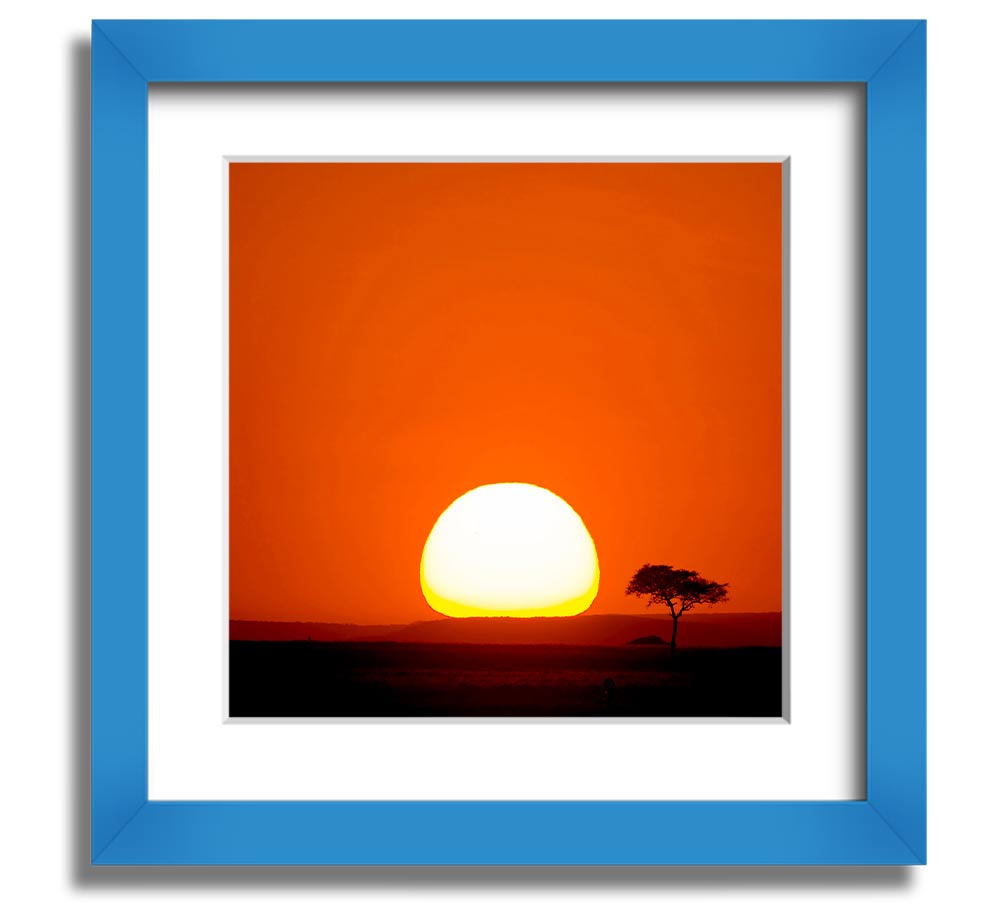 A beautifully framed print of an African sunrise, showcasing vibrant colors and stunning landscape details.