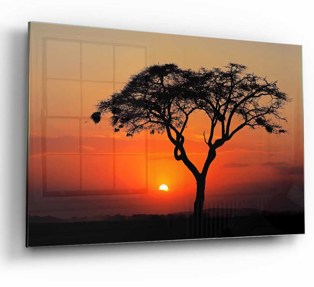 A vibrant glass print depicting an African sunset with rich colors of orange, red, and purple, perfect for modern home decor.