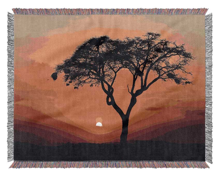 A luxurious African Sunset throw blanket made from 100% cotton, featuring a thermal weave design in rich, warm colors.