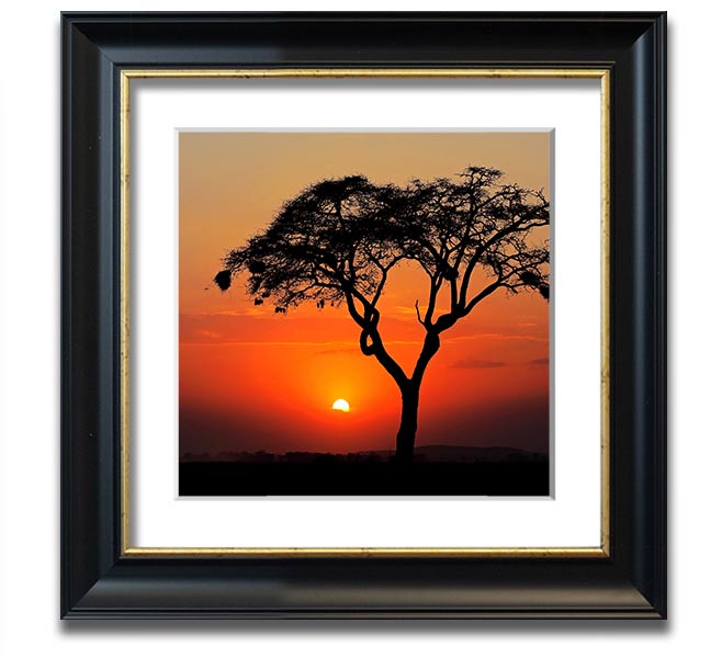 A beautifully framed print of an African sunset, showcasing vibrant colors and serene landscapes, ready to hang.