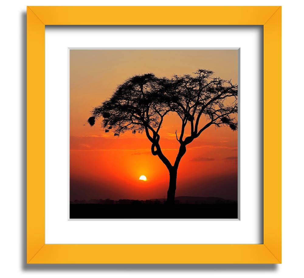 A beautifully framed print of an African sunset, showcasing vibrant colors and serene landscapes, ready to hang.