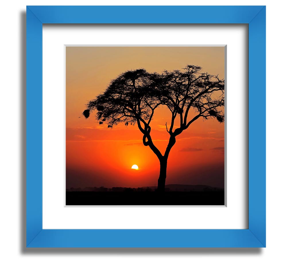 A beautifully framed print of an African sunset, showcasing vibrant colors and serene landscapes, ready to hang.