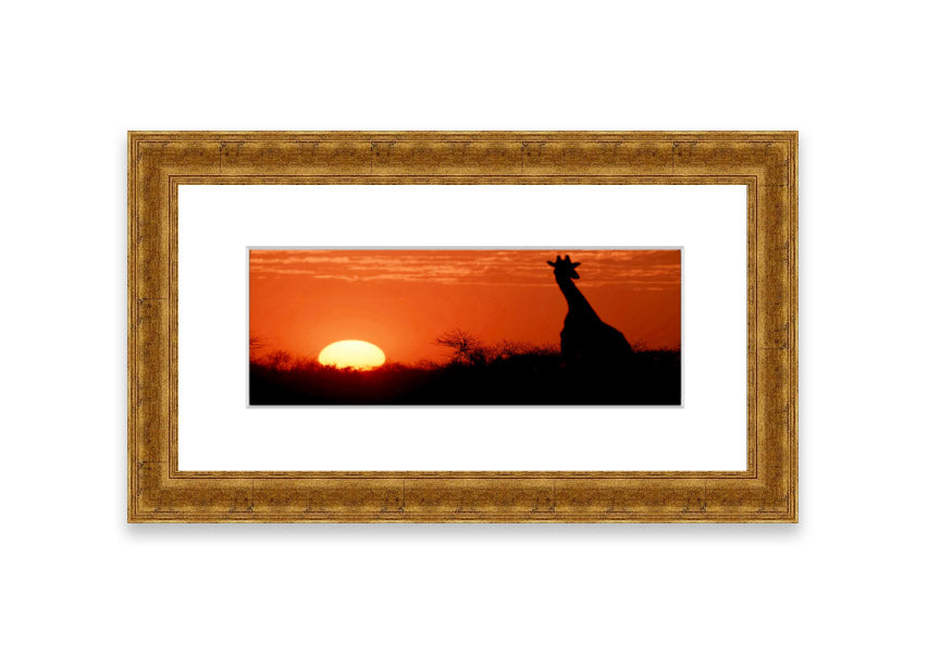 Framed print of an African sunset with a giraffe silhouette, showcasing vibrant colors and elegant design.