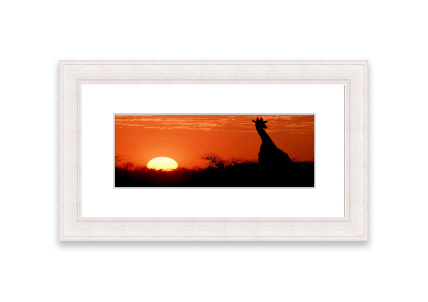 Framed print of an African sunset with a giraffe silhouette, showcasing vibrant colors and elegant design.