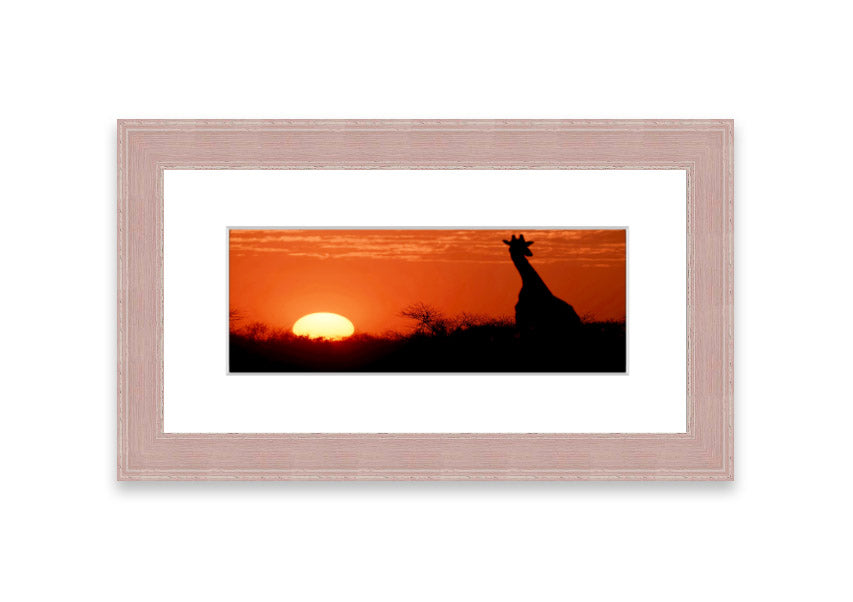 Framed print of an African sunset with a giraffe silhouette, showcasing vibrant colors and elegant design.