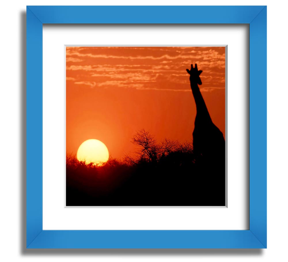 A beautifully framed print of a giraffe silhouette against a vibrant African sunset, showcasing warm colors.