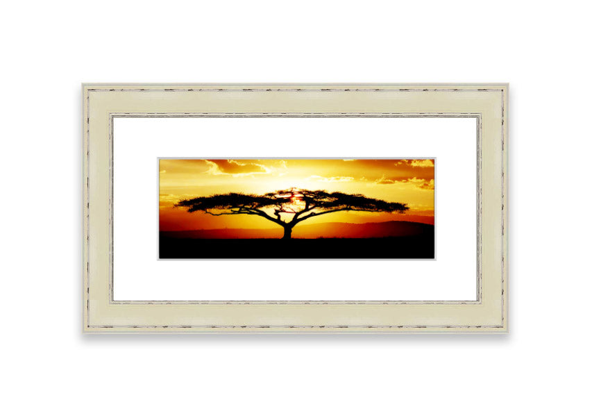 Framed print of an African tree at sunset, showcasing vibrant colors and a serene landscape.