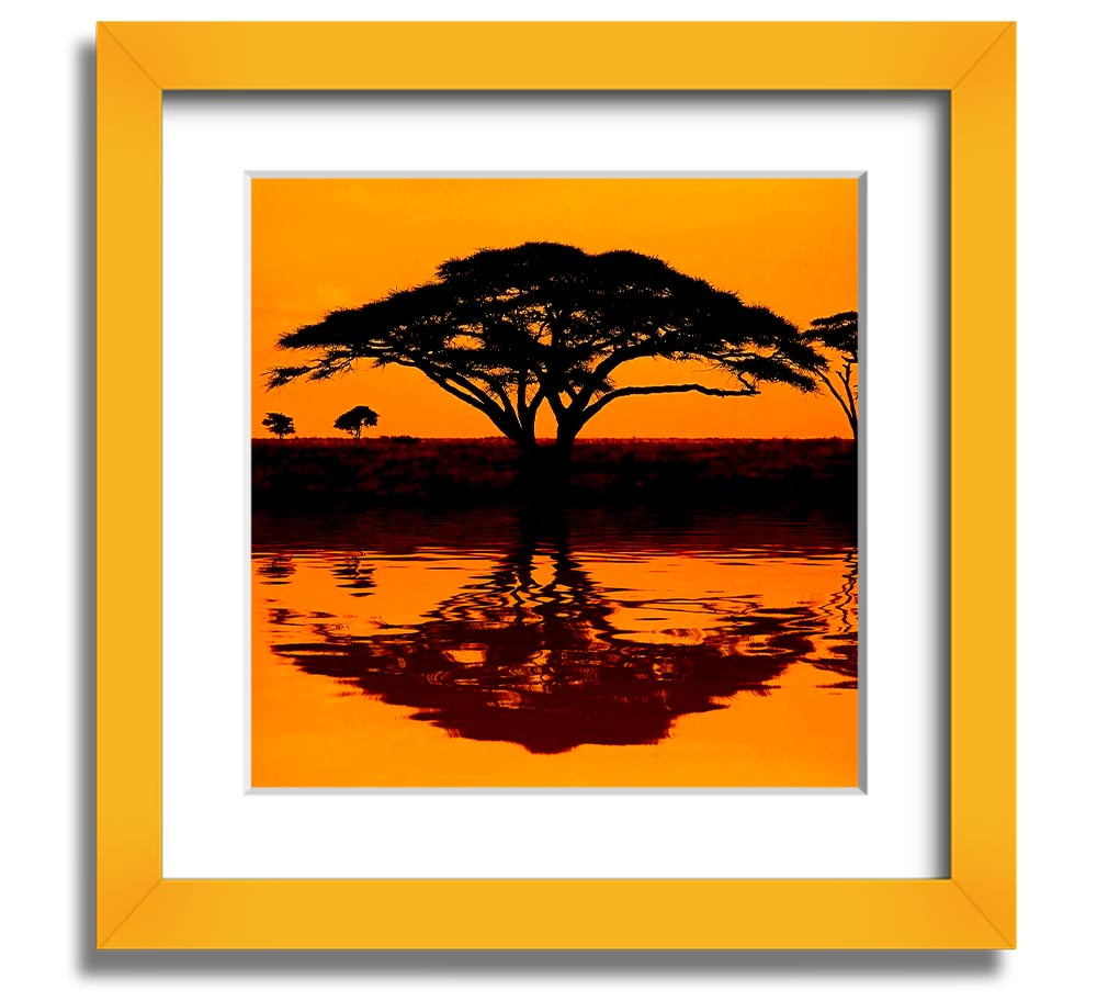 A beautifully framed print of an African tree reflecting in serene waters, showcasing vibrant colors and intricate details.