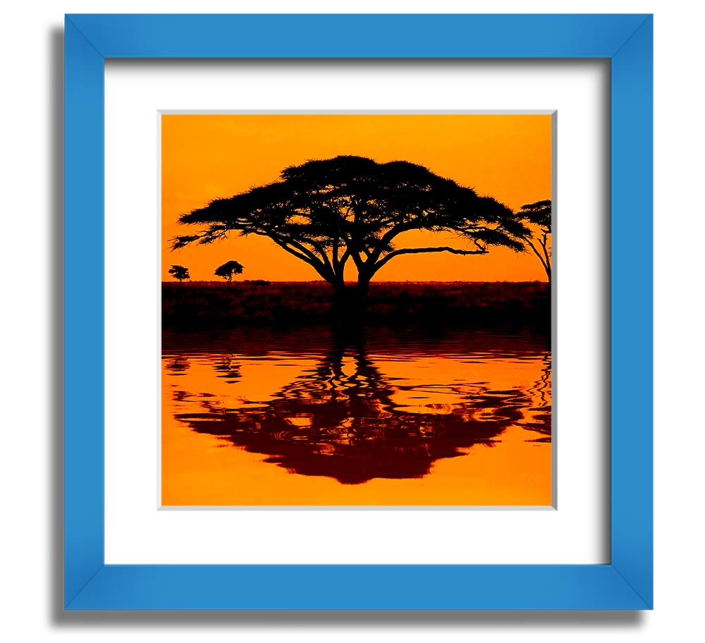 A beautifully framed print of an African tree reflecting in serene waters, showcasing vibrant colors and intricate details.