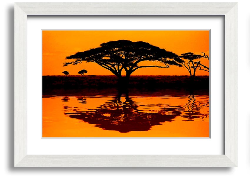 Framed print of an African tree reflection, showcasing vibrant colors and intricate details, ready to hang.