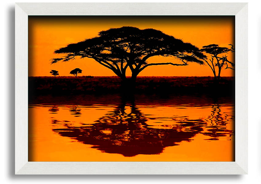 Framed print of an African tree reflection, showcasing vibrant colors and intricate details, ready to hang.