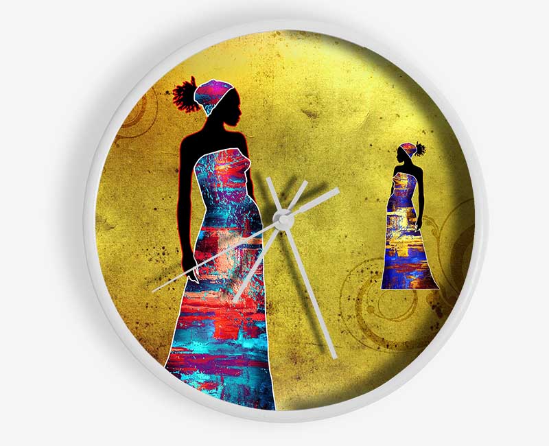 A stylish African Tribal Art clock made from natural bamboo, featuring a round face and clear Plexiglas lens, available in black, white, and natural frame colors.