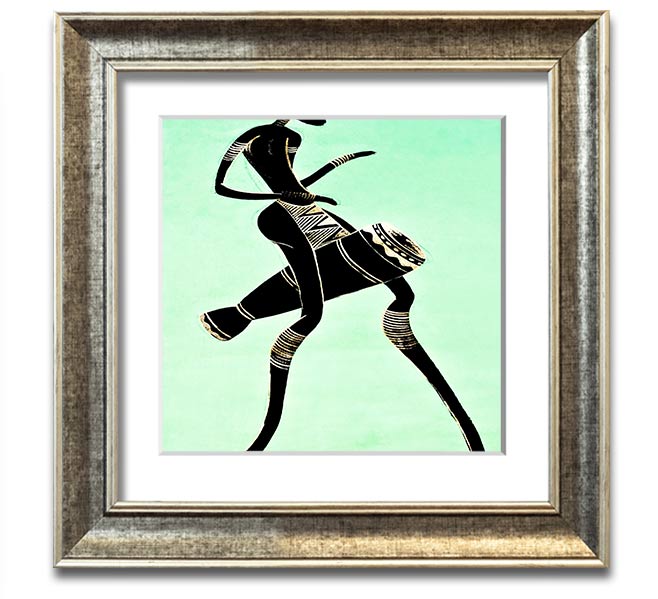 A vibrant square framed print of an African tribal dancer, showcasing dynamic movements and rich colors, ready to hang.