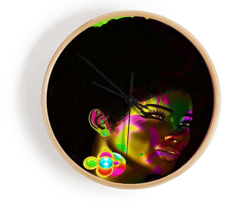 Afro Funk clock made from natural bamboo with a round face, available in black, white, and natural colors, featuring a clear Plexiglas lens.