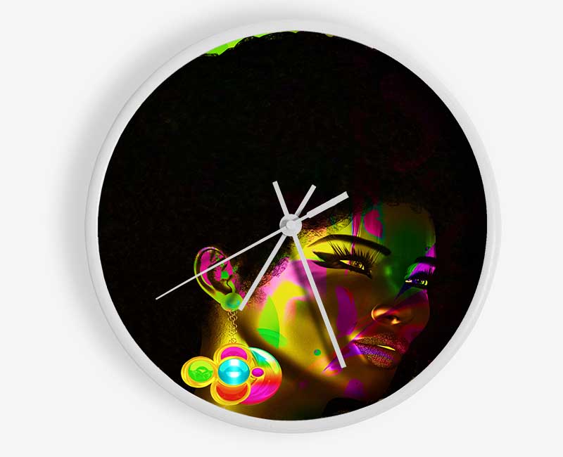 Afro Funk clock made from natural bamboo with a round face, available in black, white, and natural colors, featuring a clear Plexiglas lens.