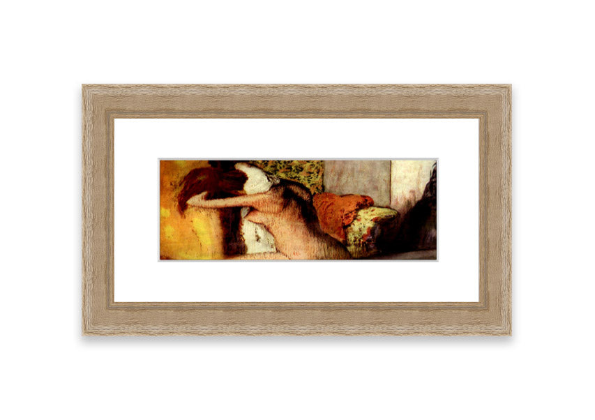 Framed print of After Bathing #2 by Degas, showcasing soft colors and elegant design, ready to hang.