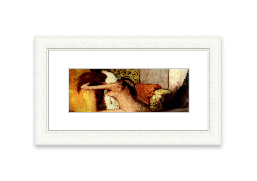 Framed print of After Bathing #2 by Degas, showcasing soft colors and elegant design, ready to hang.