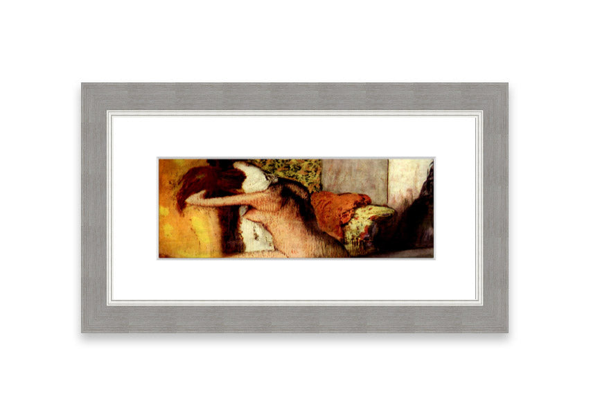 Framed print of After Bathing #2 by Degas, showcasing soft colors and elegant design, ready to hang.