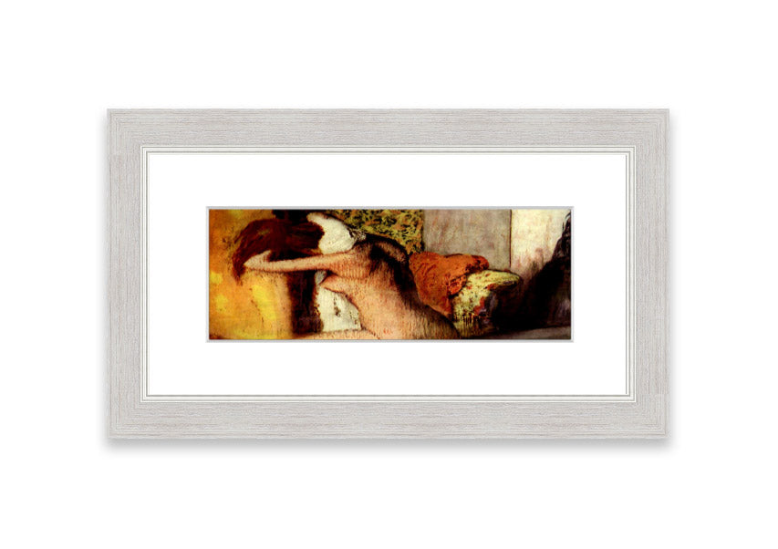 Framed print of After Bathing #2 by Degas, showcasing soft colors and elegant design, ready to hang.