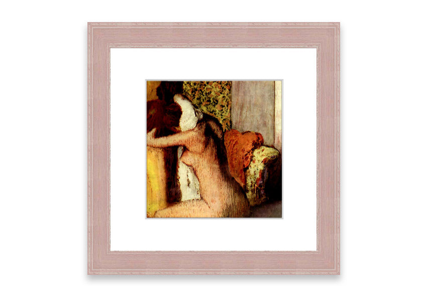 Framed print of After Bathing #2 by Degas, showcasing soft colors and elegant design, ready to hang.