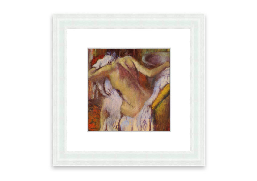 Framed print of After Bathing #4 by Degas, showcasing soft colors and elegant design, ready to hang.