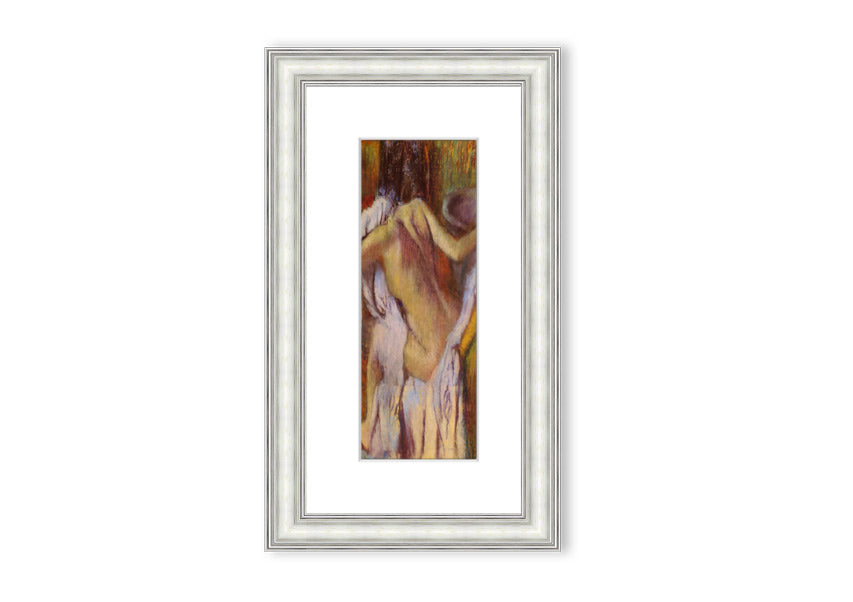 Framed print of After Bathing #4 by Degas, showcasing soft colors and elegant design, ready to hang.