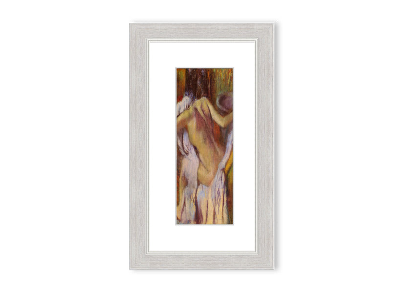 Framed print of After Bathing #4 by Degas, showcasing soft colors and elegant design, ready to hang.