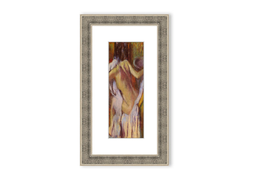 Framed print of After Bathing #4 by Degas, showcasing soft colors and elegant design, ready to hang.