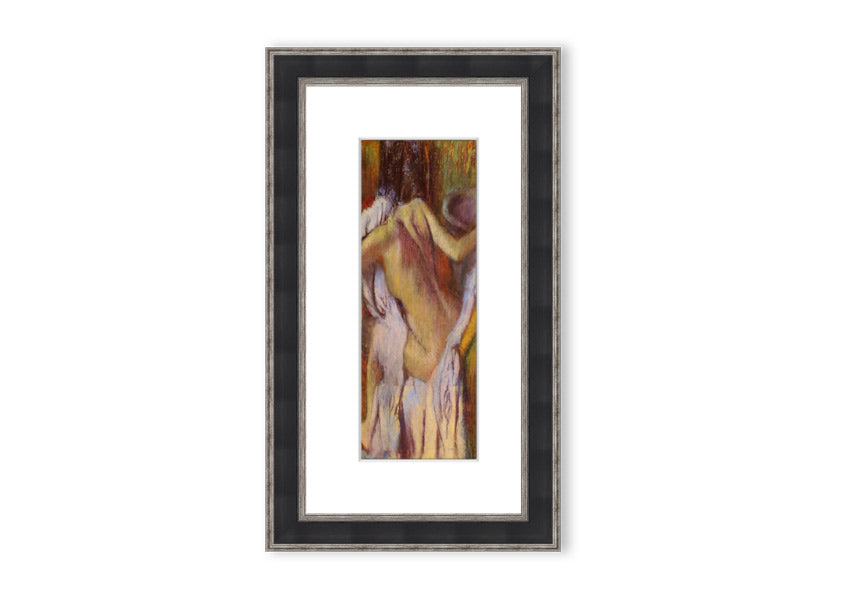 Framed print of After Bathing #4 by Degas, showcasing soft colors and elegant design, ready to hang.