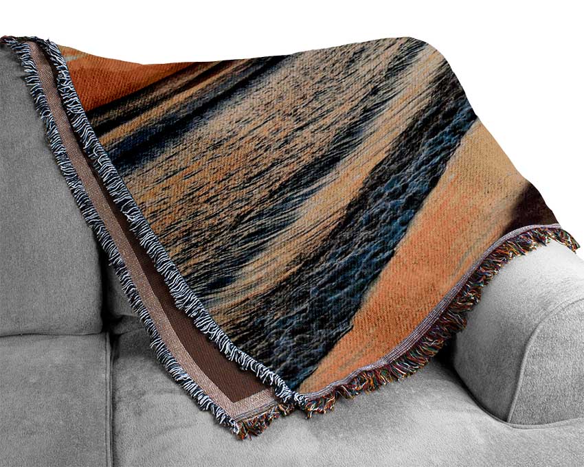 A luxurious After The Storm throw blanket made from 100% cotton, featuring a thermal weave design in a classic style, perfect for enhancing home decor.