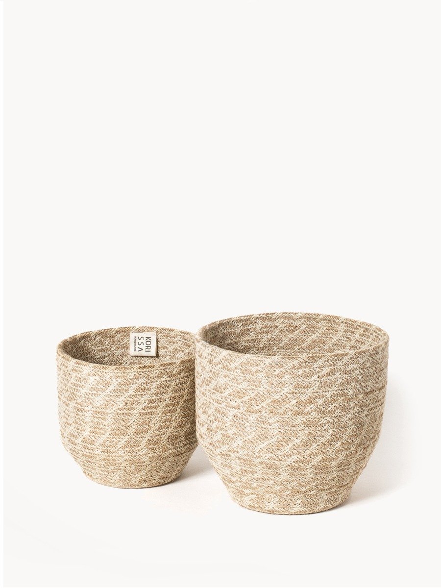 Agora Bin made from natural jute yarn, featuring a soft white and natural colorway, perfect for home decor and organization.