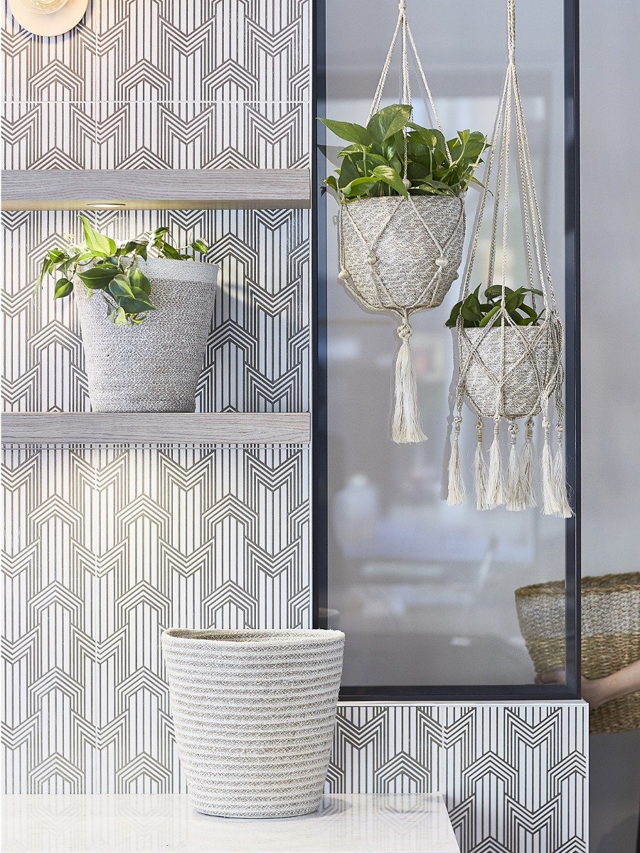 Agora Bin made from natural jute yarn, featuring a soft white and natural colorway, perfect for home decor and organization.