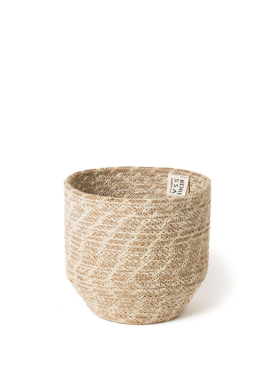 Agora Bin made from natural jute yarn, featuring a soft white and natural colorway, perfect for home decor and organization.