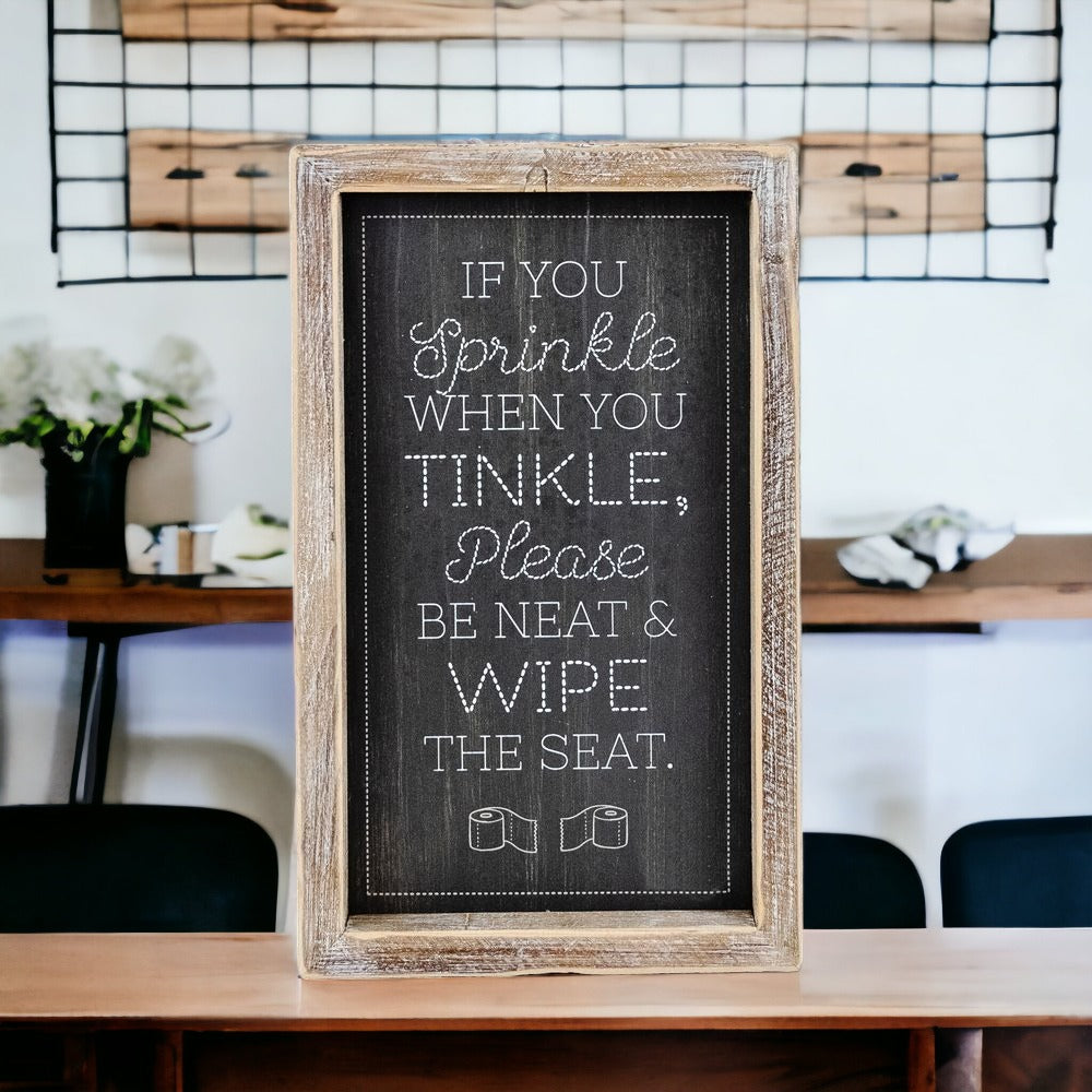 Aim + Sprinkle Tinkle double-sided bathroom sign with wooden frame, featuring humorous cleanliness messages.