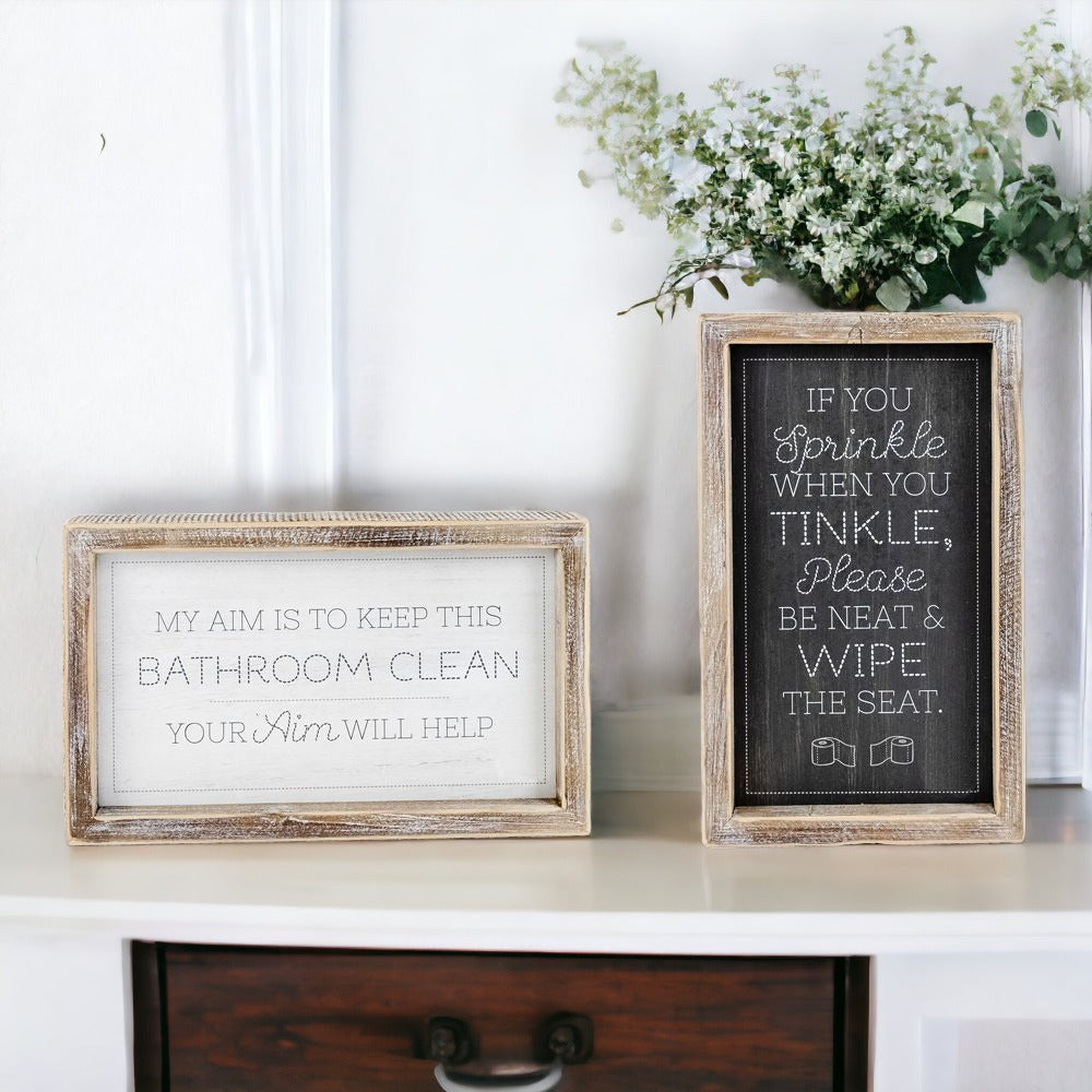 Aim + Sprinkle Tinkle double-sided bathroom sign with wooden frame, featuring humorous cleanliness messages.