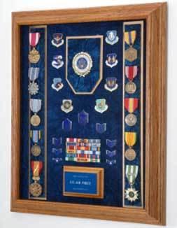 A beautifully crafted Air Force Awards Display Case featuring a personalized laser engraved metal plate and glass front, showcasing military achievements.