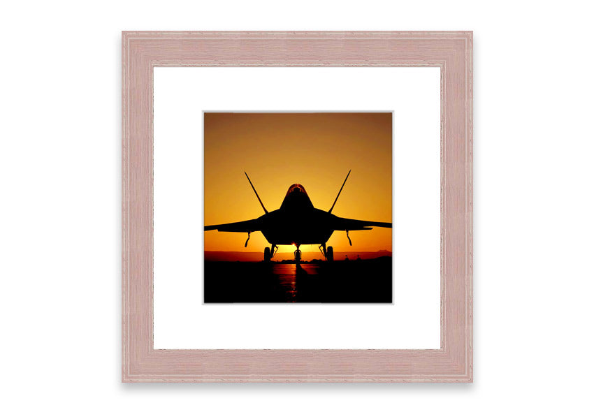 Framed print of an airplane at sunset, showcasing vibrant colors and a serene landscape.