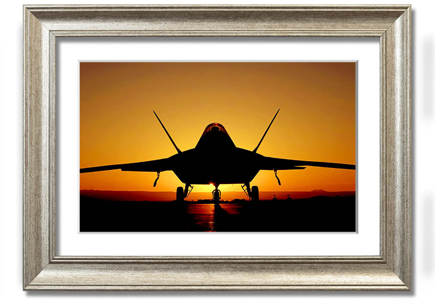 Framed print of an airplane at sunset, showcasing vibrant colors and a beautiful silhouette.